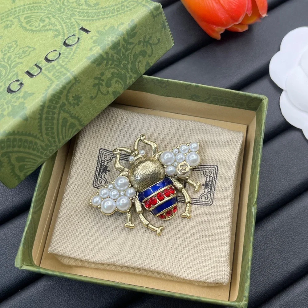 Gucci Gold-Tone Bee Brooch with Pearls and Red & Blue Enamel